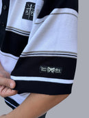 Polo tejida”Miclo” caramelo negro/blanco/gris