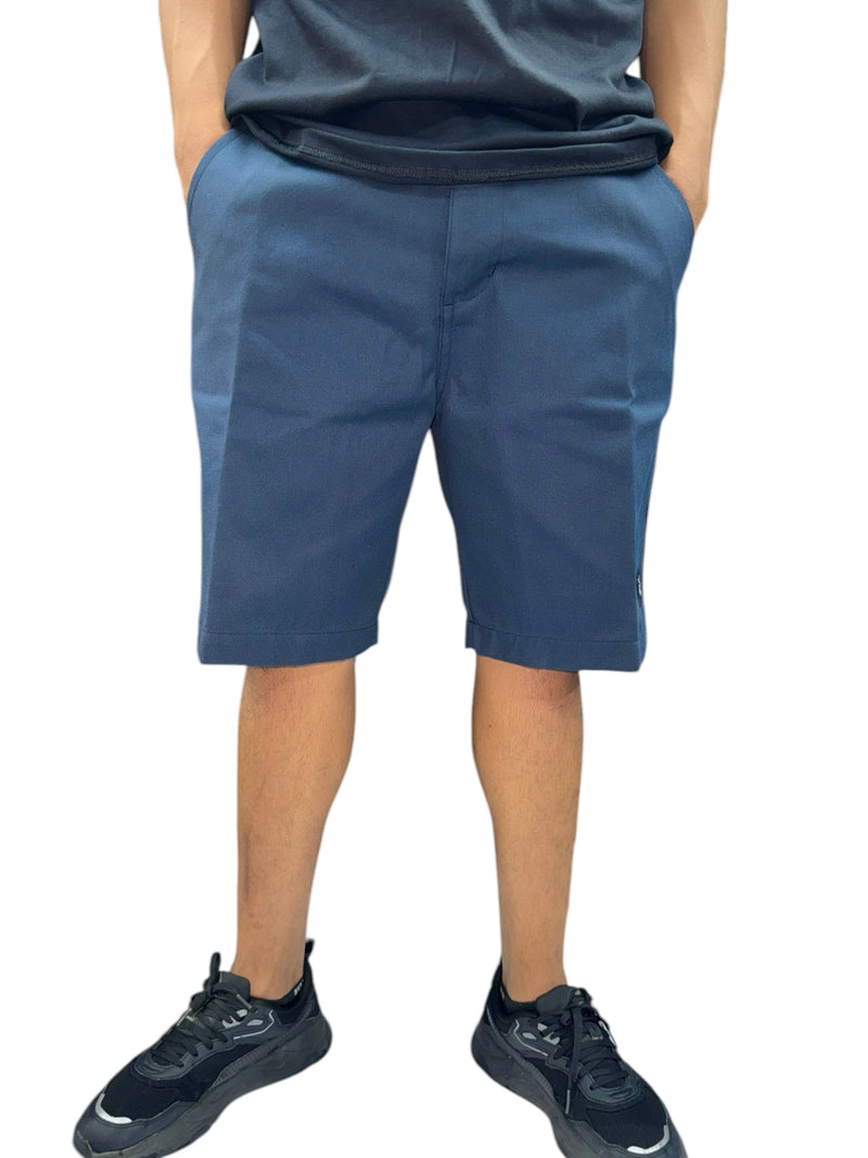 Navy blue “diamond” shorts.